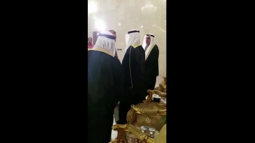Arab macho men at a reception