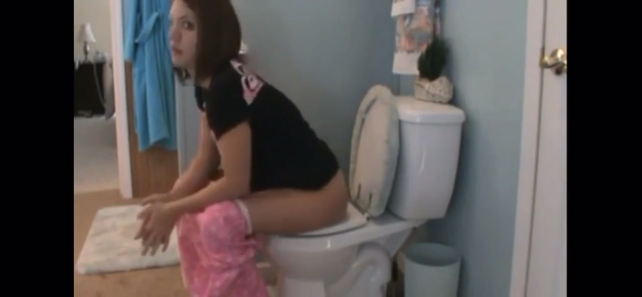 Girl diarrhea on he toilet