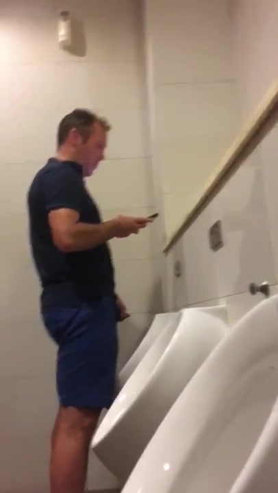 HOT GUYS PISSING AT THE URINAL 1