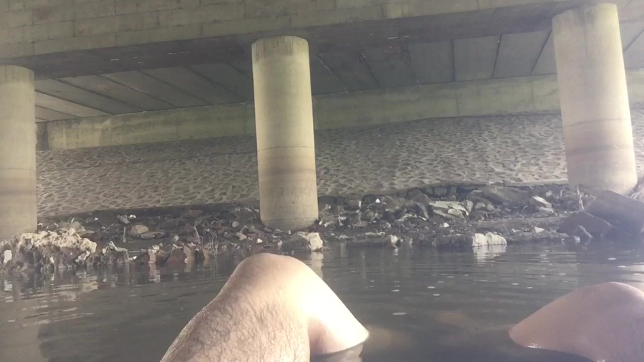 Me underwater under a bridge