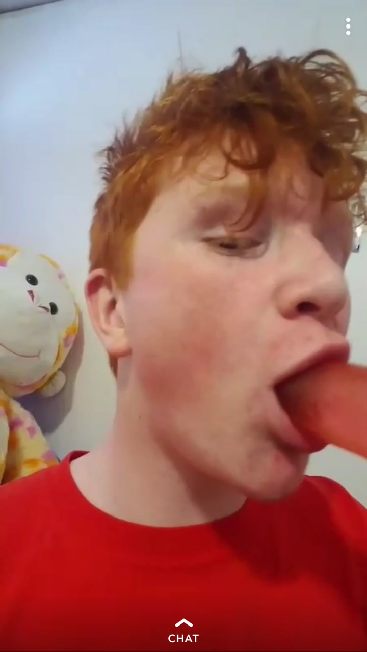 Redhead loves to suck his dildo