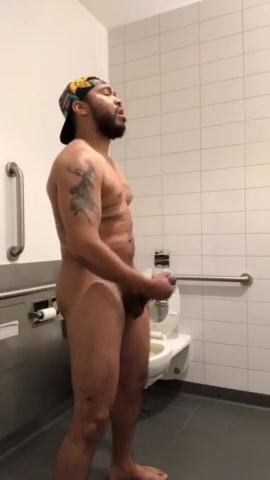 Black pig busts a nut in the stall