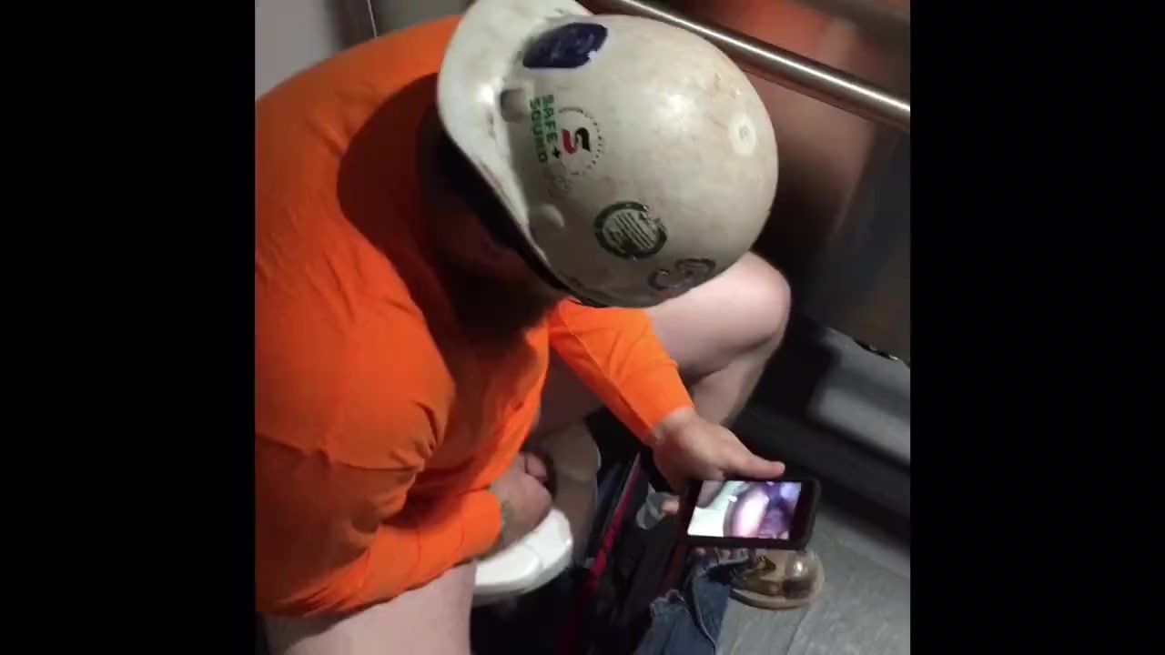 Construction Guy wanking in toilet