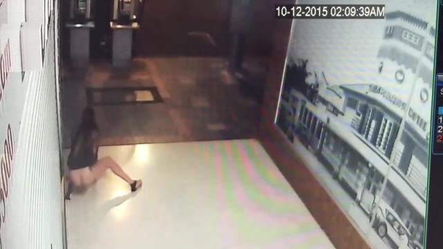 Desperate girl gets caught on security cam peeing in public