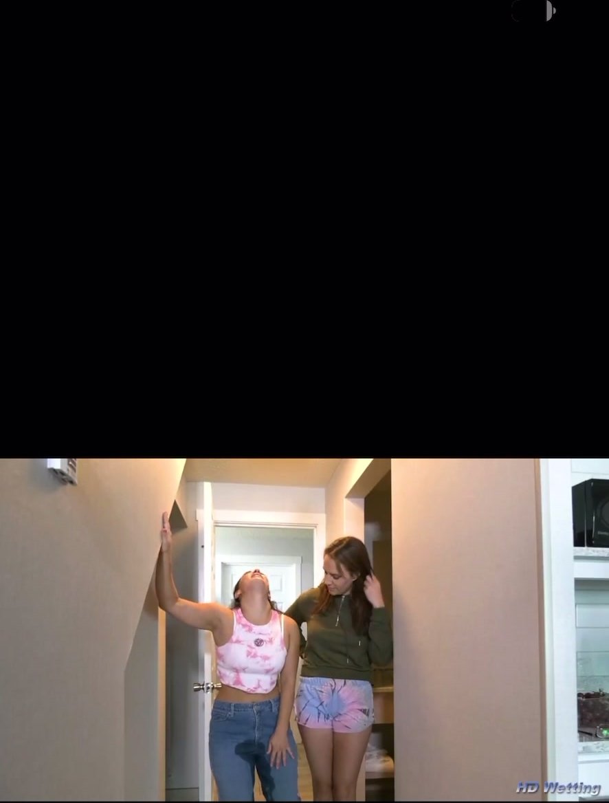 Two girls piss one jeans