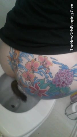 Giant poop from tattooed ass