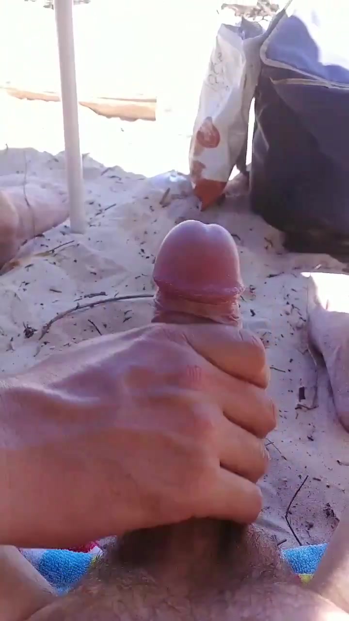 Simple handjob on the beach