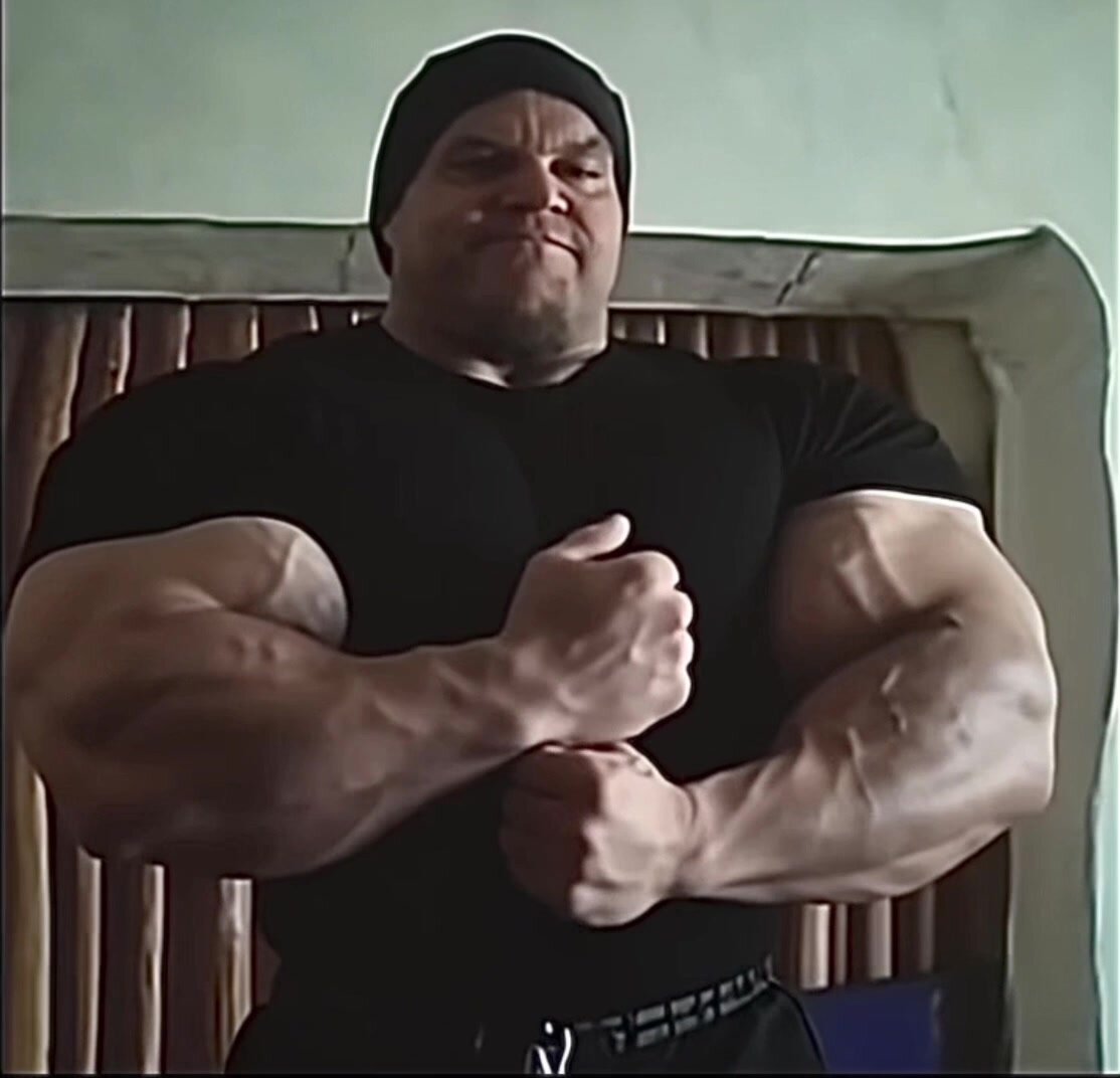 HUGE, MASSIVE BICEPS IN TIGHT T-SHIRT 2