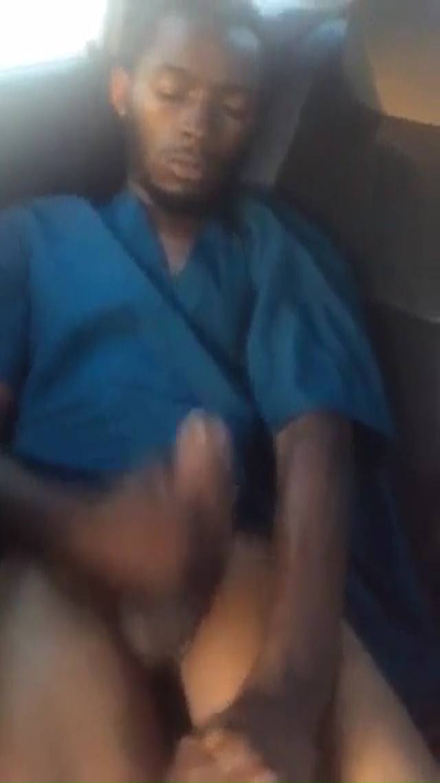 a black guy jerks off and comes in a car
