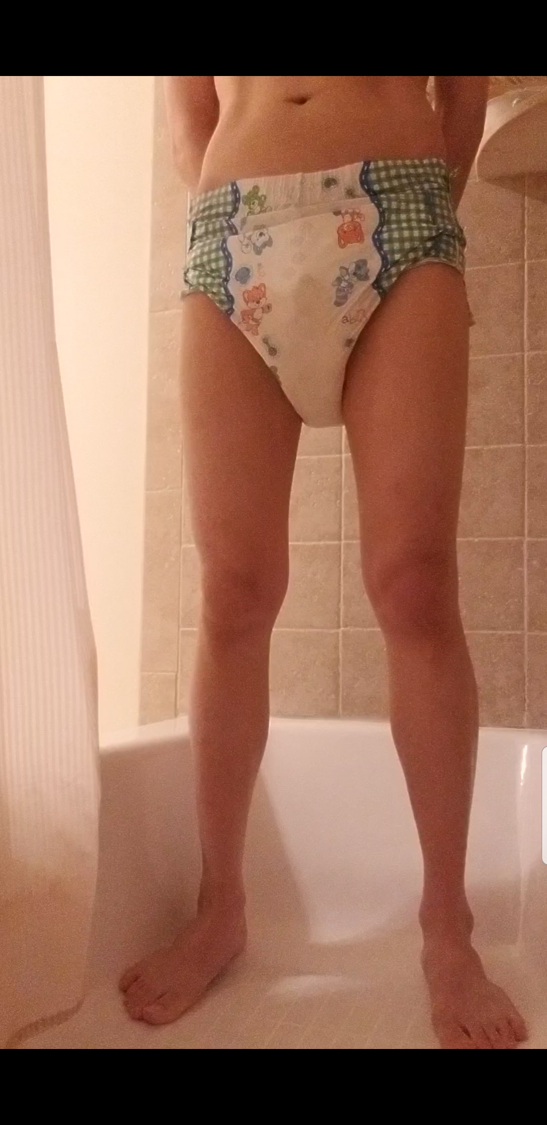 Playing in a wet & messy diaper