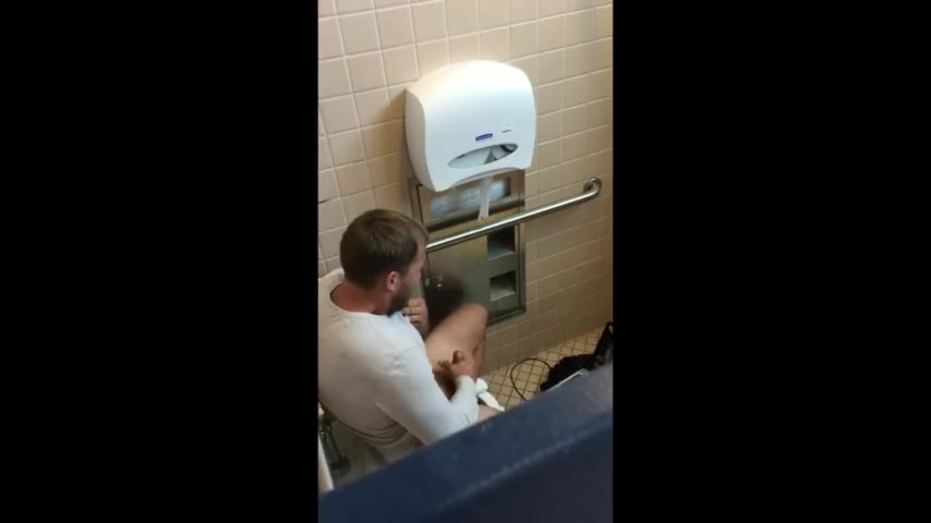 SPY STRAIGHT GUY JERKING AND CUMMING IN RESTROOM