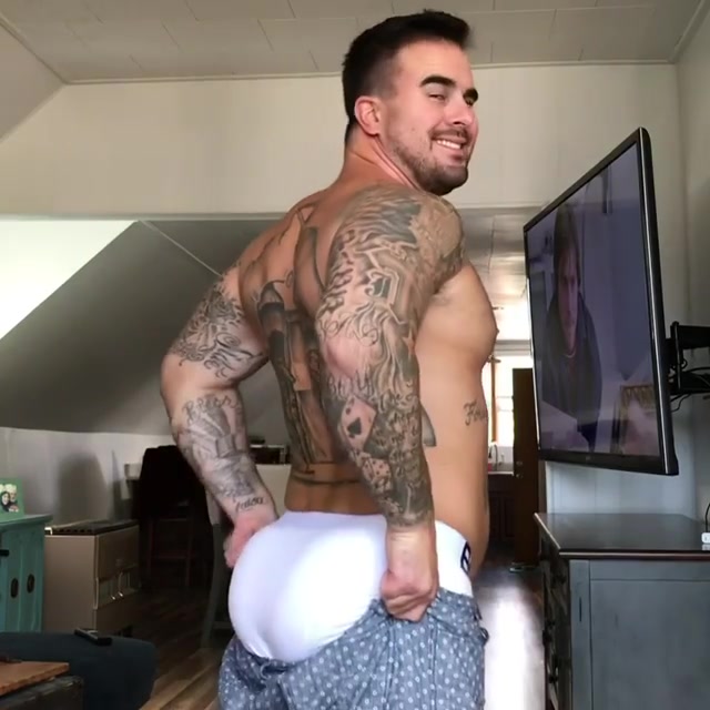 GUY STRUGGLES TO GET SHORTS OVER HIS FAT ASS