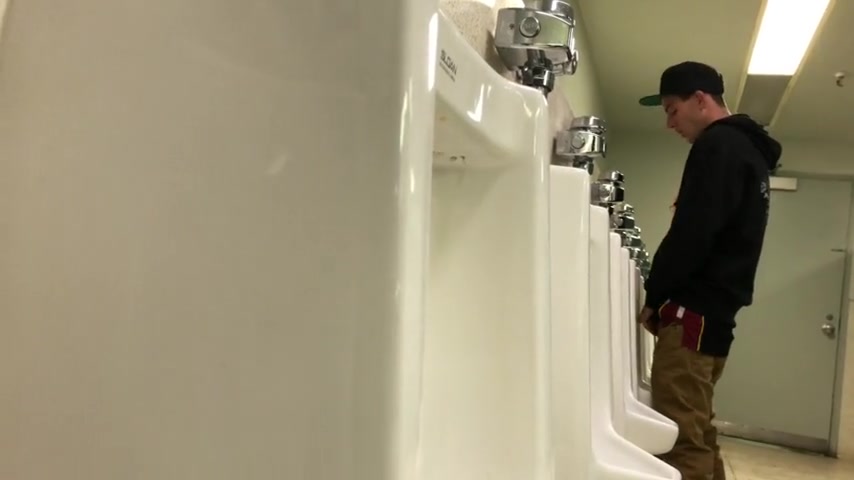 HOT MEN PISSING IN THE URINAL