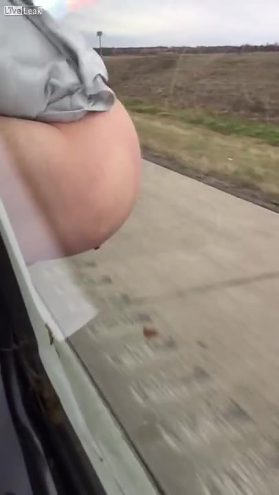 Dude pooping out a bus window
