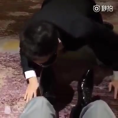 Slave licking master's shoes