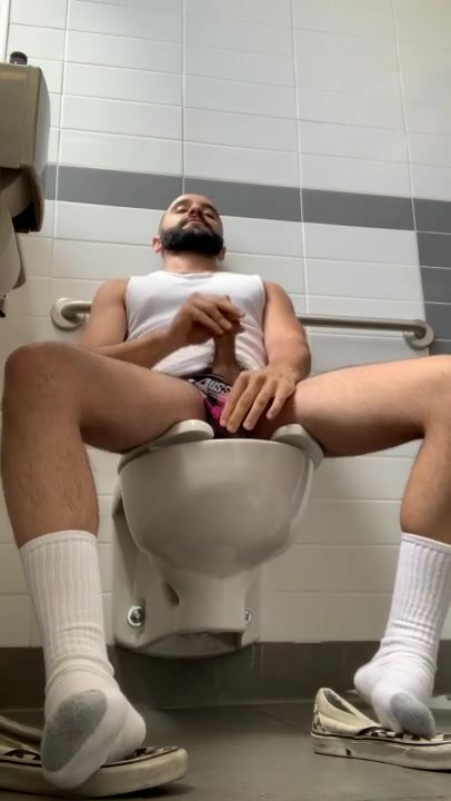 Pig popperbating in a stall