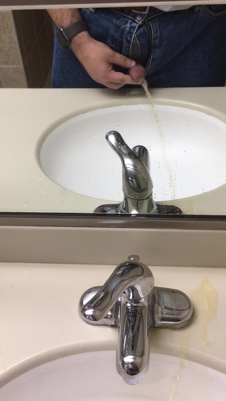 Naughty piss in the sink