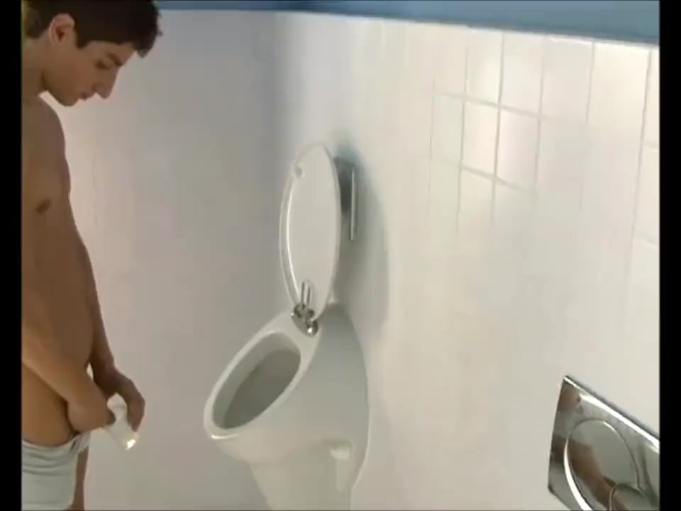 college guy pissing in a sample cup
