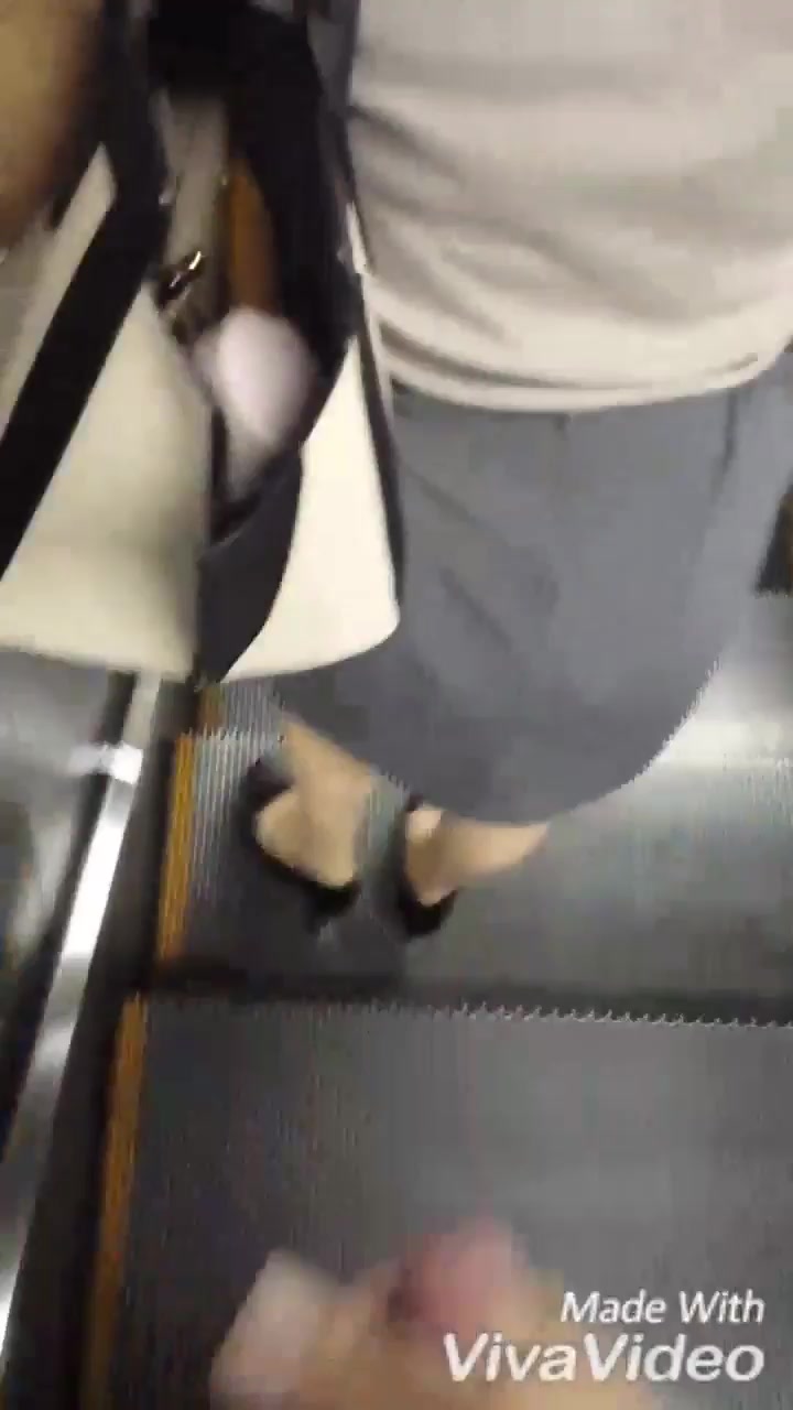 Public cum on Japanese girl on escalator