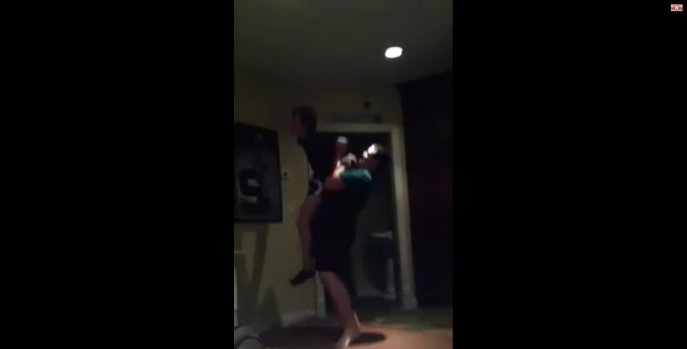 boys wrestling with a hanging wedgie