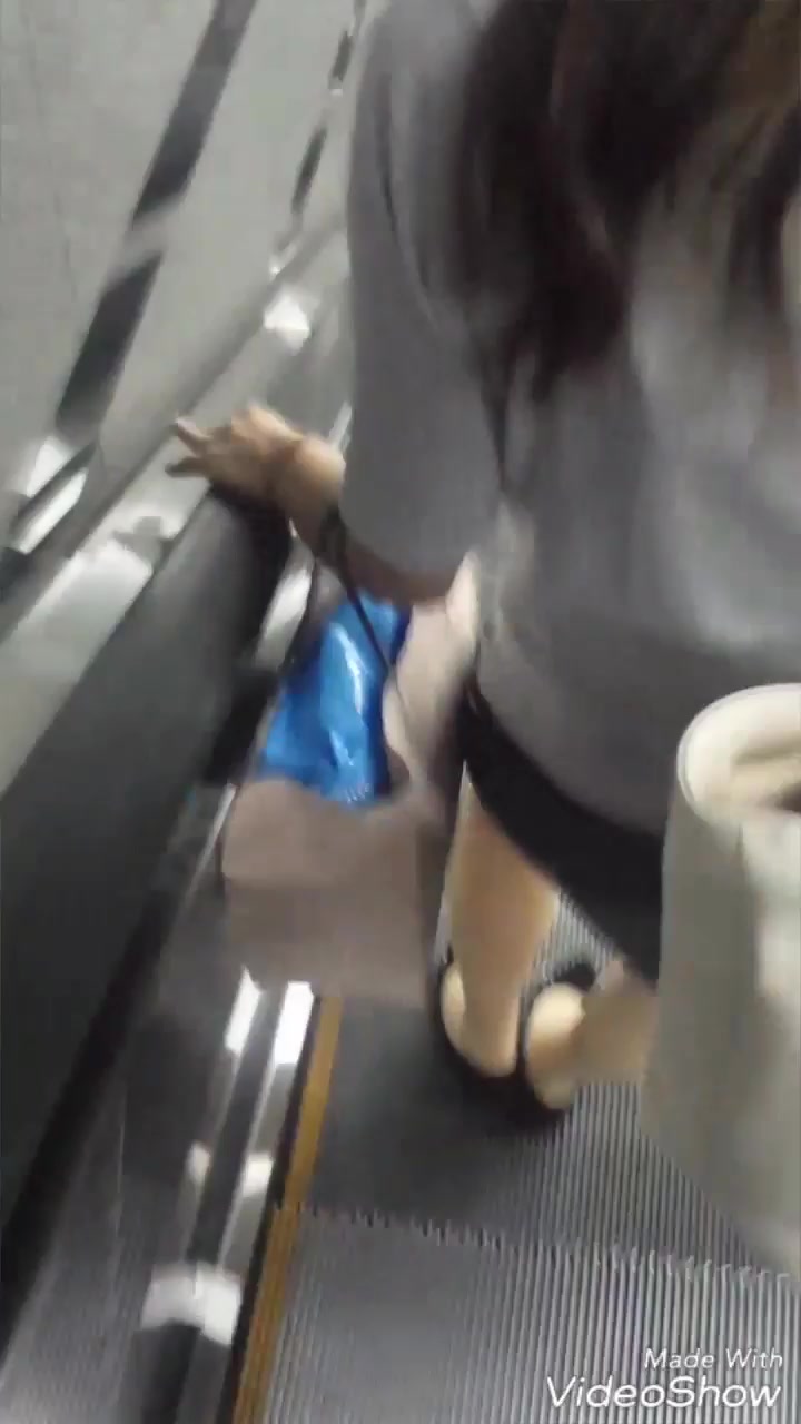 Public cum on Japanese girl on escalator 2