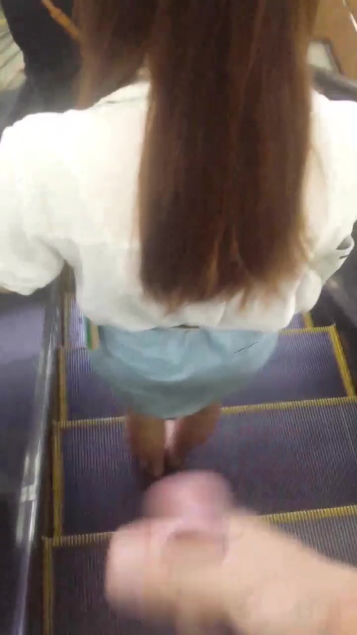 Public cum on Japanese girl on escalator 3