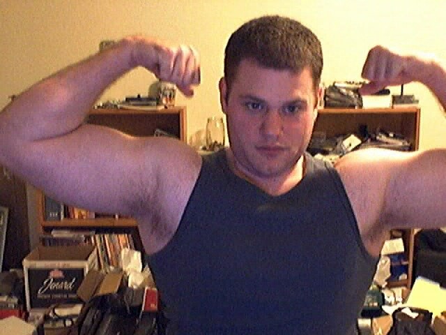 Guy showing his muscles
