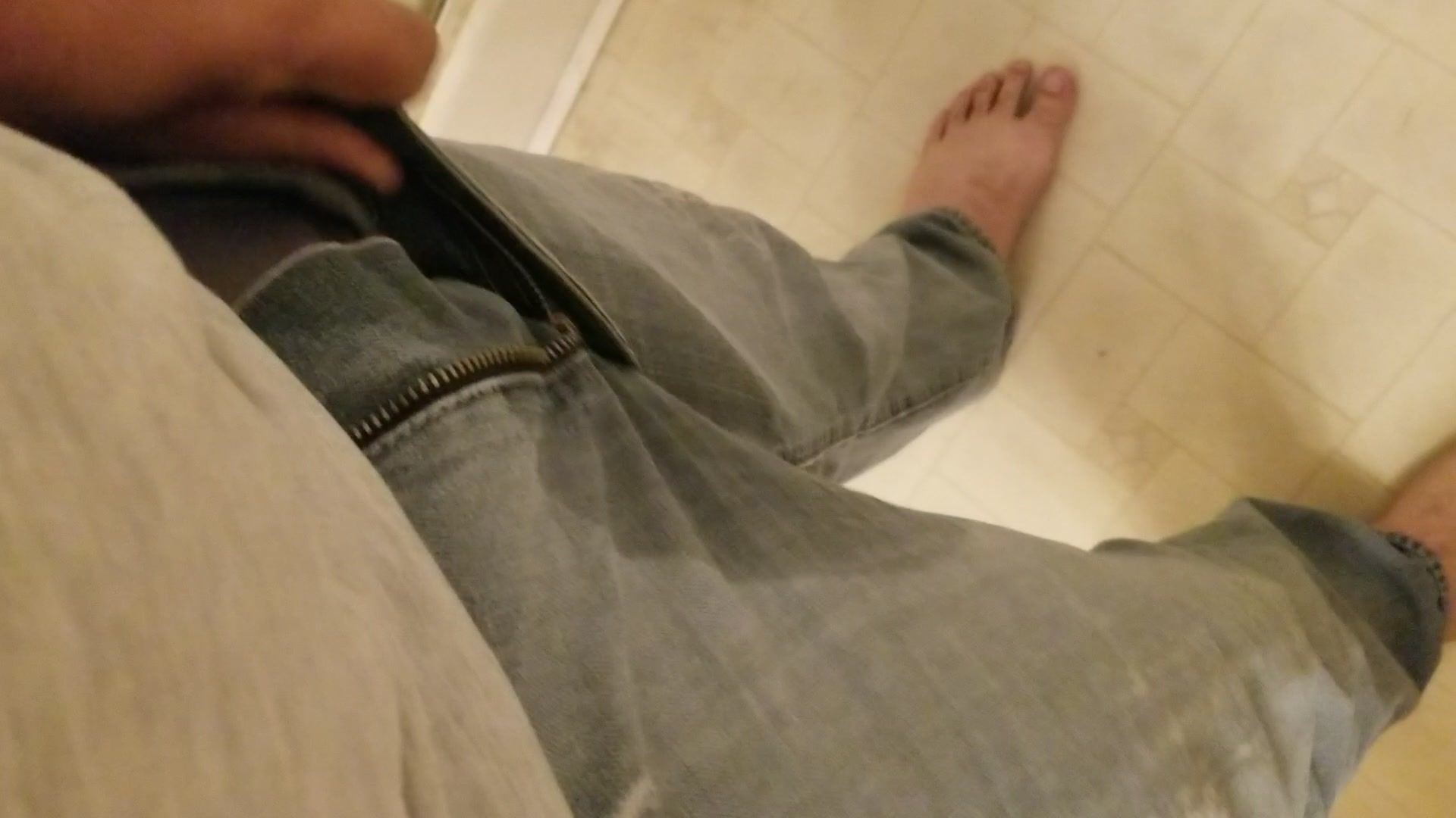 Stripping out of piss soaked jeans
