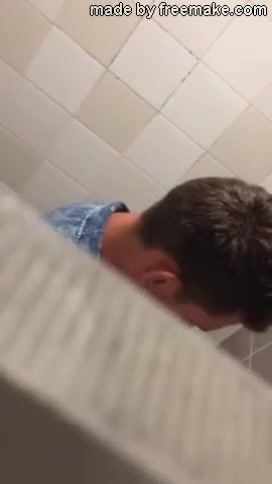 Spy an hot straight guy pissing in a public toilet