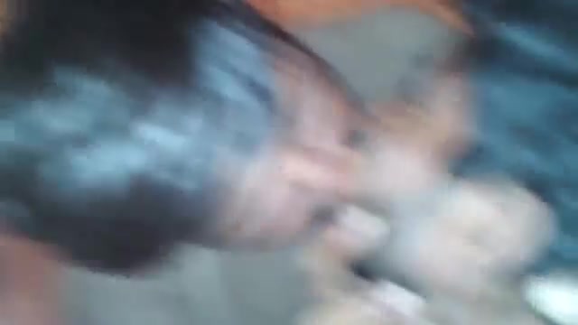 Indian gay man and boy kissing