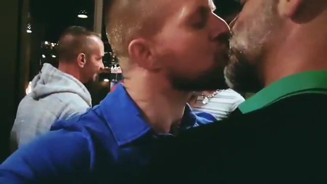 Two hot men kissing passionately