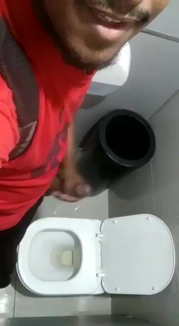 Amateur handjob in a public bathroom
