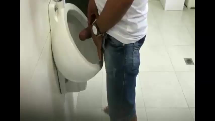 Spying huge dick in bathroom