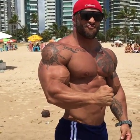 Bodybuilder in the beach
