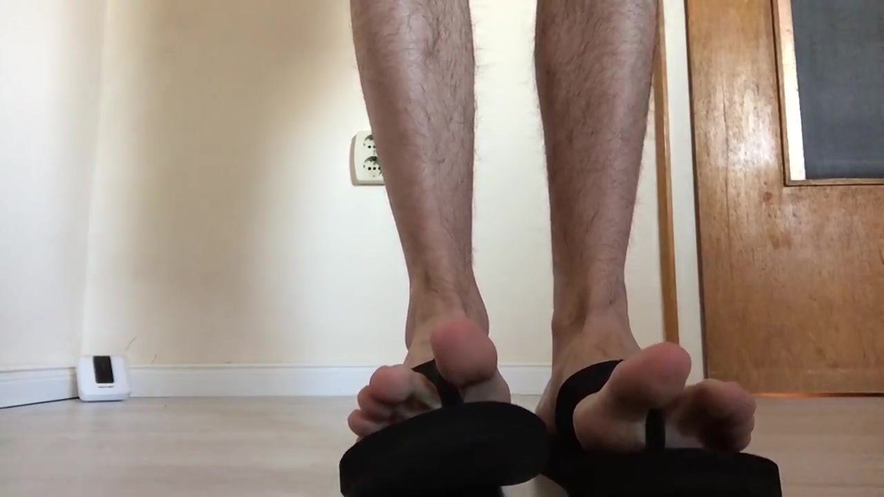 Teenage boy feet in flip flops - video 2
