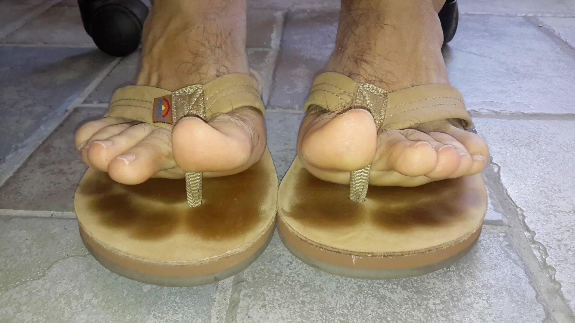 Male feet in flip flops - video 3