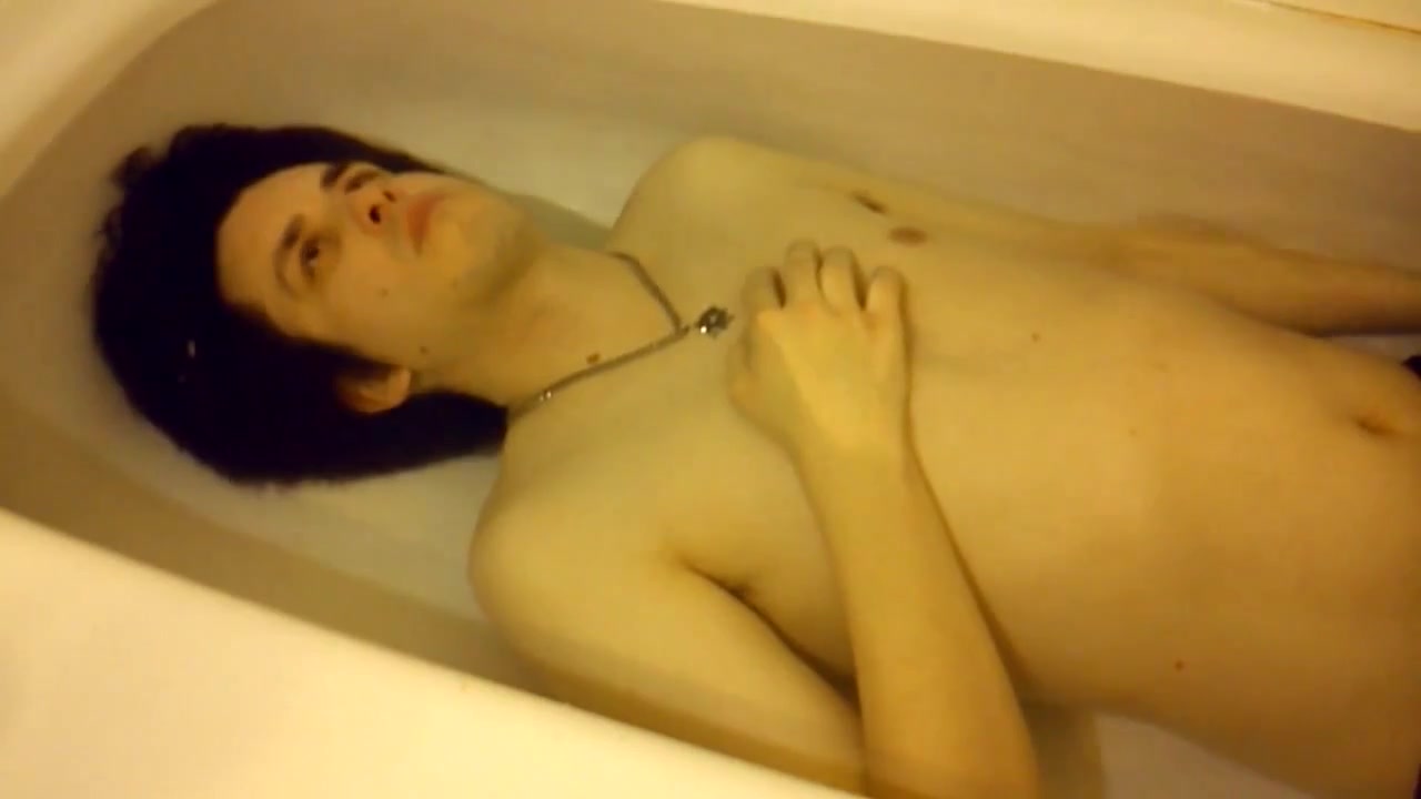 Barefaced and breatholding in his tub