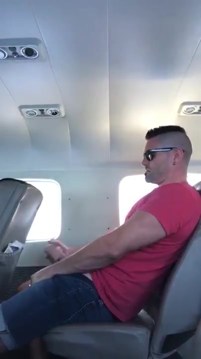 Pig busts a nut on an airplane