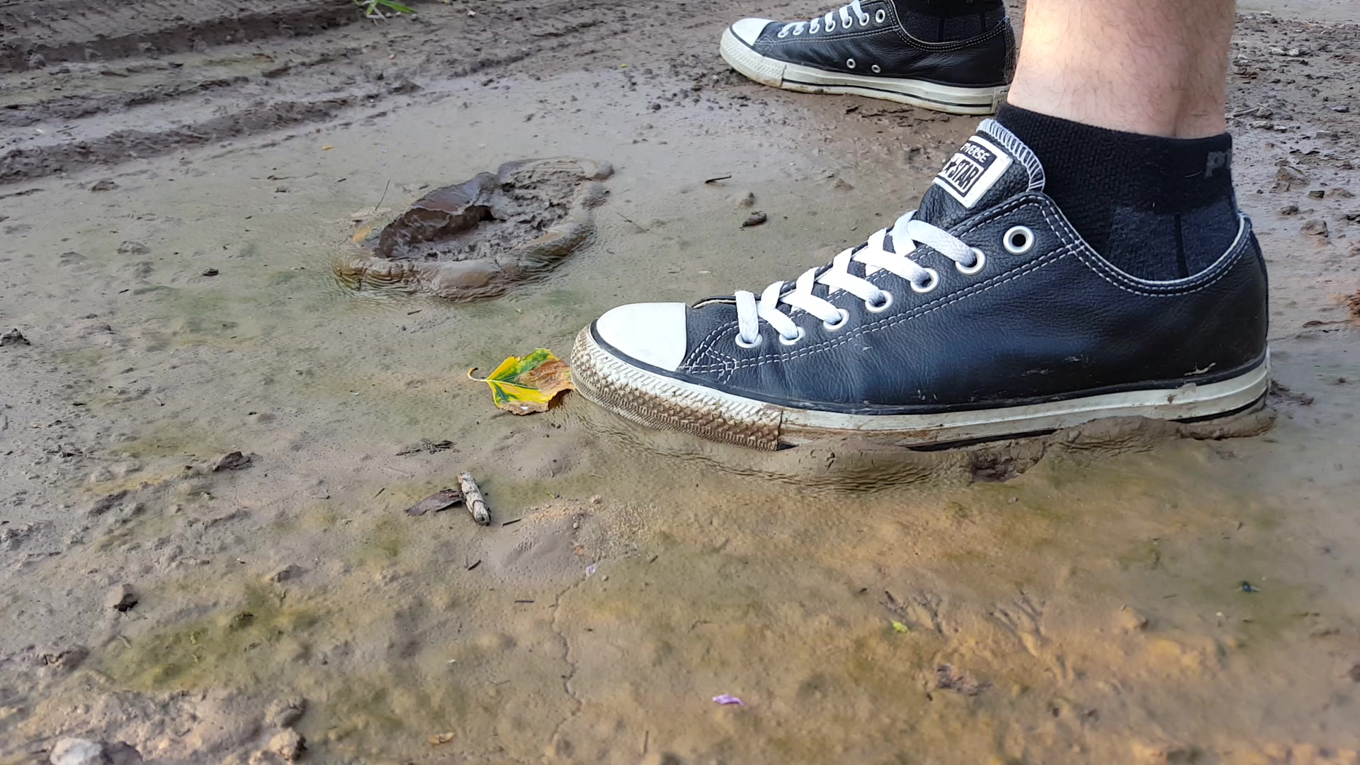 Leather Converse in Mud