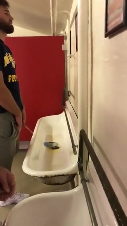 GREAT MEN PISSING AT THE URINAL