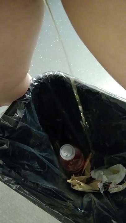 Pissing in Gym Garbage