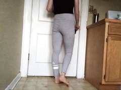 Desperate girl soaks leggings outside bathroom