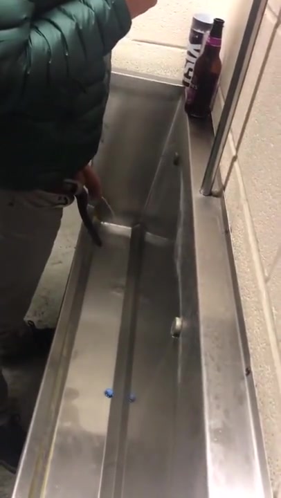 GREAT BOY PISSING AT THE URINAL