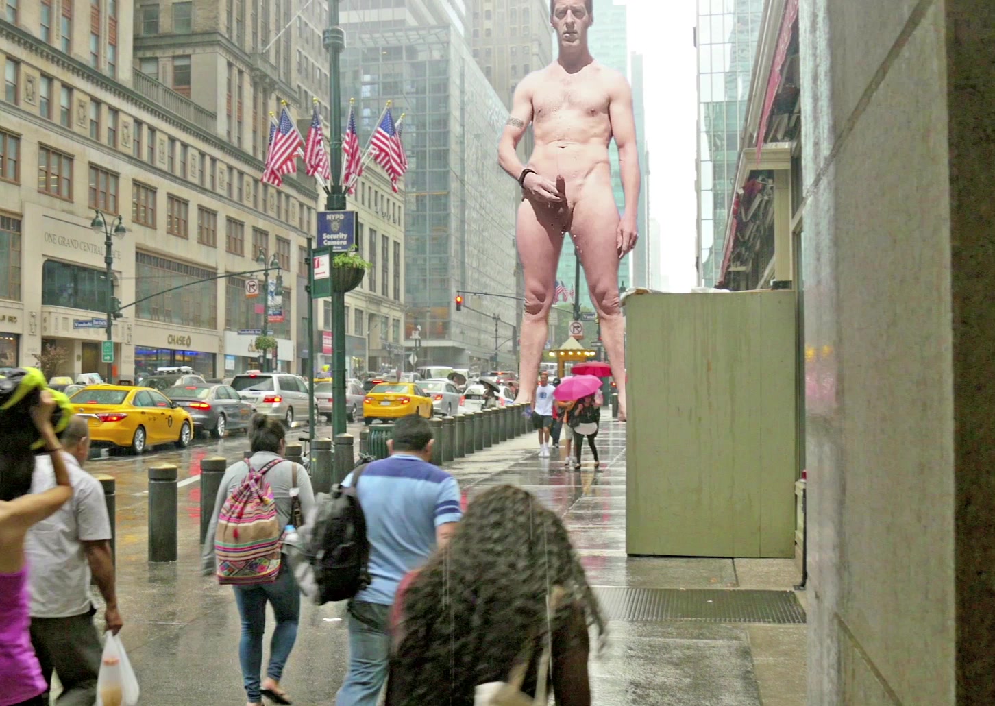 Giant pisses on tiny people in New York