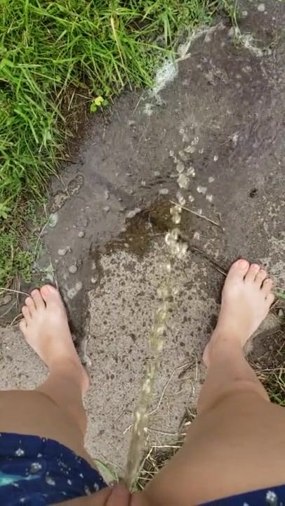 barefoot babysitter pees on sidewalk