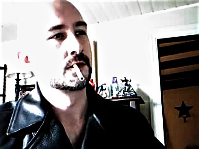 MAN SMOKE ARCHIVE - LEATHER SKINHEAD SMOKES A RED ON CAM