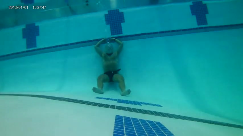 Hairy barefaced daddy holding breath underwater
