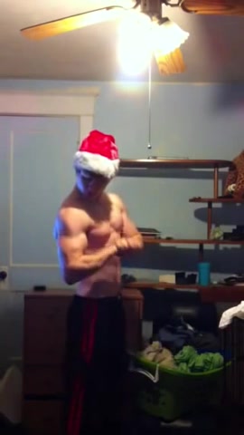 Santa Beautifully flexes his muscles
