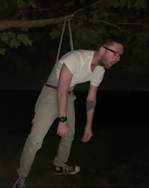 Guy Stuck in Hanging wedgie from tree