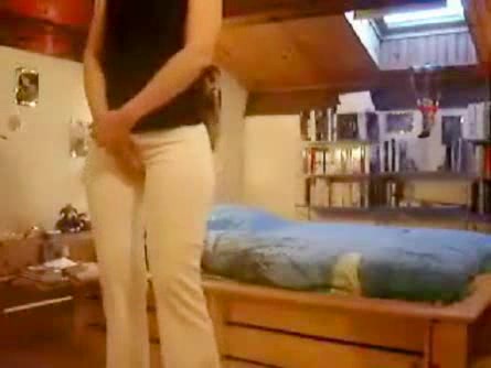 girl wetting white pants